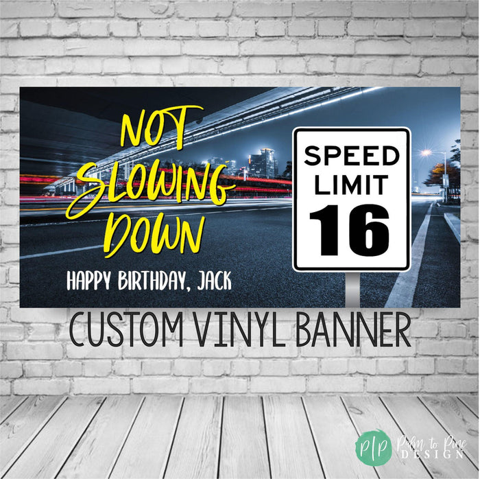 boys 16th birthday banner with a drivers license car theme, includes a speed limit sign with the age 16 and wording "Not slowing Down" with a personalized birthday message