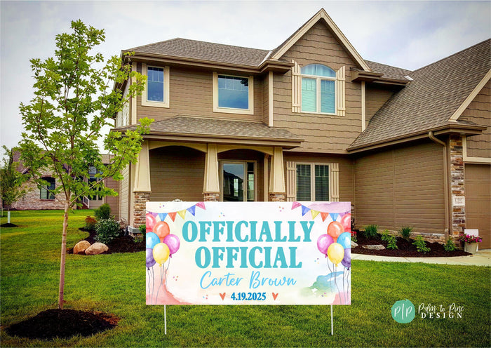 a officially adopted sign is in front of a house