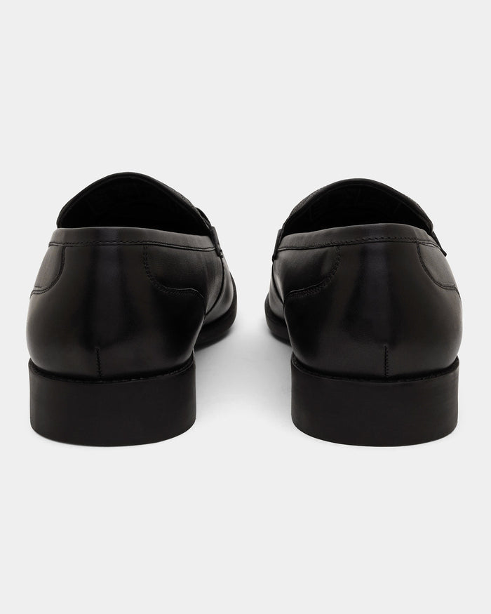 Black Textured Slip On Shoes - Apron