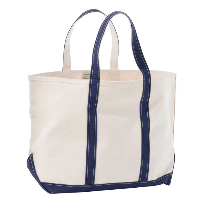 White tote bag with navy blue accents on a white background