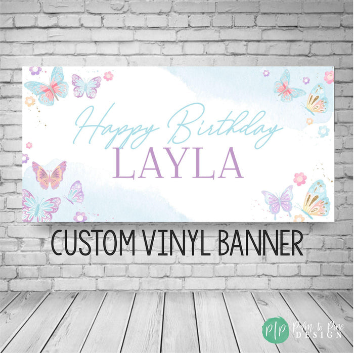 Pastel butterfly birthday banner with soft pink, purple, and mint butterflies fluttering around personalized birthday text for girls.