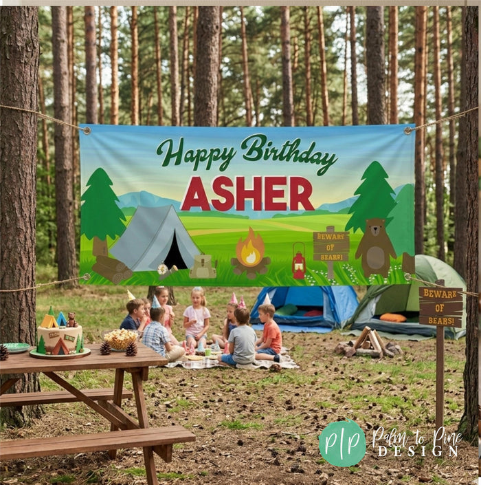 kids outdoor birthday party at campground with personalized themed banner