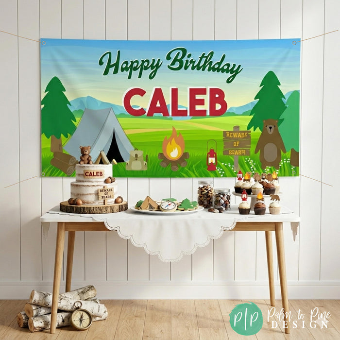 Kids Camp themed birthday banner with tent and themed desserts
