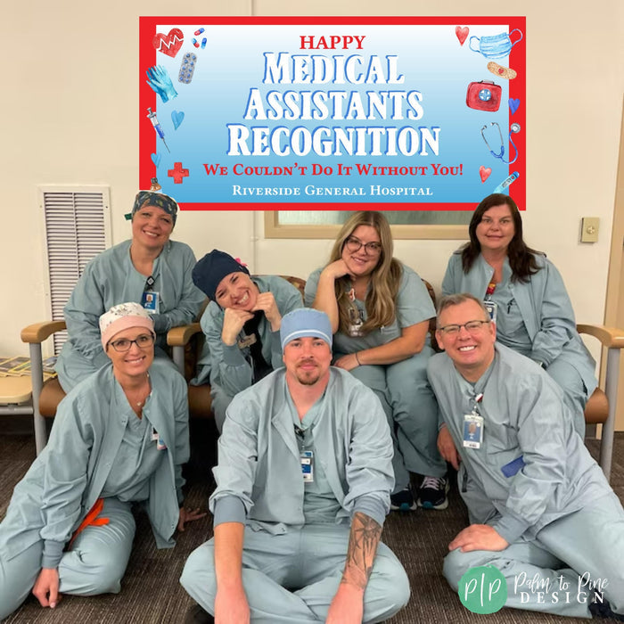 A group photo of seven medical assistants in light teal scrubs, smiling in front of a banner that says 'Happy Medical Assistants Recognition. We Couldn't Do It Without You! Riverside General Hospital.'  The banner has medical-themed icons. The medical assistants are sitting on a beige couch.  The photo is well-lit and has a professional feel.