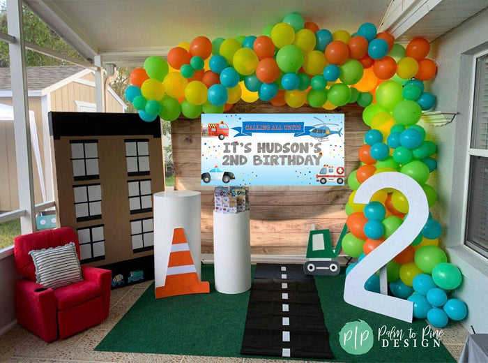 Emergency Rescue Vehicle Birthday party for boys with personalized banner and balloon garland