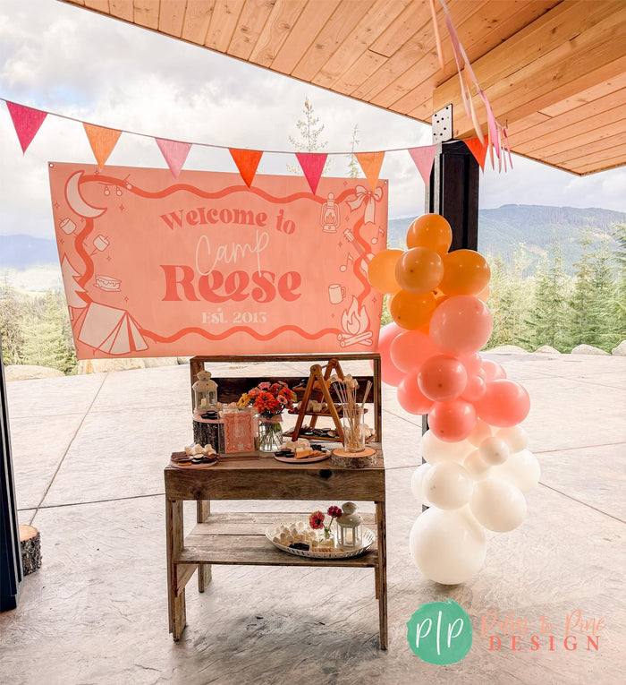 Glamping Birthday Party Banner and balloon garland with smores dessert table