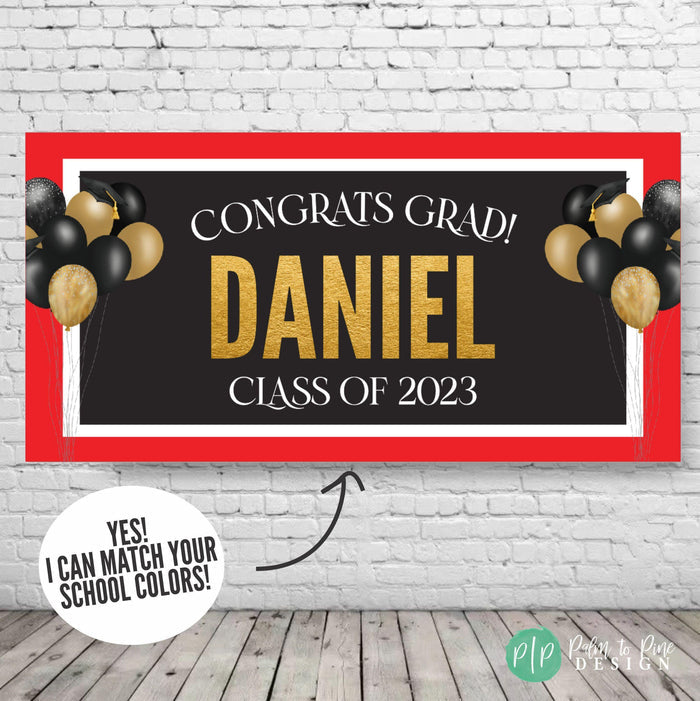 Sleek black, red and gold graduation banner with celebratory "Congrats Grad" message and "Class of 2025" wording. Adorned with gold balloons and mortarboards on each side.