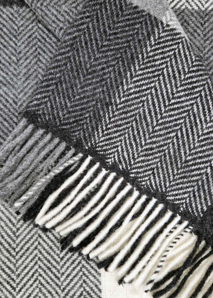 black and white herringbone patterned throw