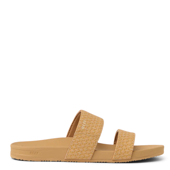 Tan sandal with woven straps on a white background