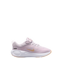 A Nike running shoe in light pink with a gold Swoosh logo, white midsole, and a hook-and-loop strap closure, shown from a side profile on a white background.