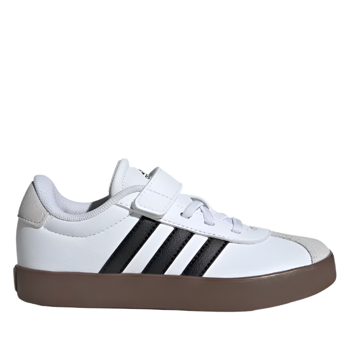 A pair of white skater-style sneakers with black stripes and a brown sole, featuring elastic laces and a hook-and-loop top strap.