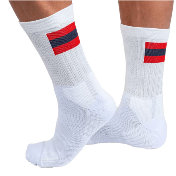 A pair of men's tennis socks with white color and a red stripe, designed to keep cool and dry with underfoot terry for comfort.