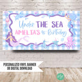 Personalized mermaid birthday banner reading Under the Sea Amelia's 4th Birthday, hung on a brick wall with vinyl or digital download options
