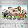 National park themed birthday banner at outdoor adventure party
