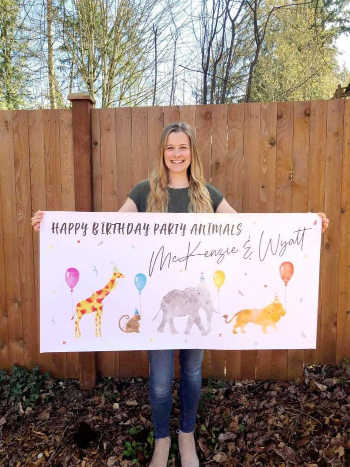Jungle birthday banner for kids with tropical leaf background and cute watercolor animals, includes personalized name and age