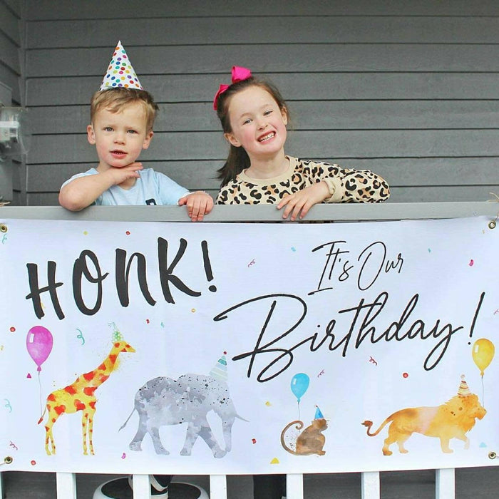 Tropical jungle birthday banner with watercolor animal illustrations, personalized for a safari or zoo-themed kids birthday party