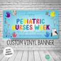 Custom vinyl banner for Pediatric Nurses Week.  The light blue banner features colorful text, illustrations of medical tools, and handprints.  It says 'Happy Pediatric Nurses Week,' 'Thank you for all you do!' and 'New York Presbyterian Hospital.' The banner is customizable.