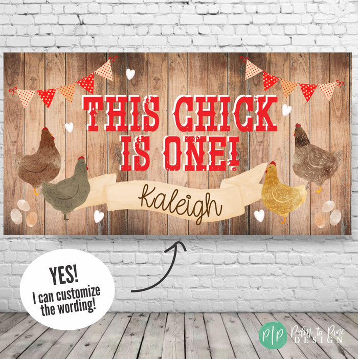 The image is a banner with a chicken theme, featuring a banner with the text "THIS CHICK IS ONE!" and illustrations of chickens. The banner is set against a wooden background with red and white polka dot flags.