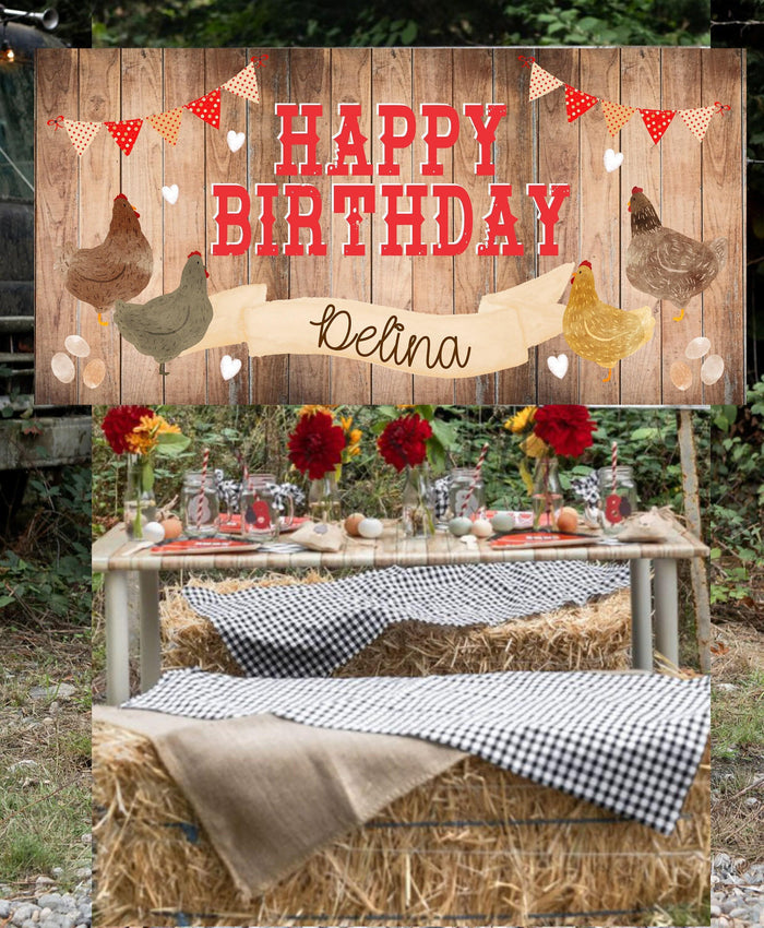 A birthday party setup with a wooden fence backdrop, featuring a banner that reads "Happy Birthday" and illustrations of chickens. The table is decorated with flowers, candles, and other party items.