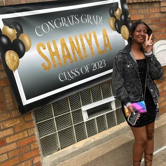 A black and gold banner with the text 'Congrats Grad! Graduates name and Class of date