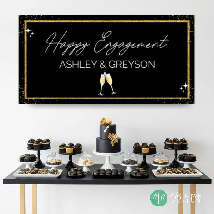 Elegant Black and Gold Engagement Party with modern dessert table and personalized banner