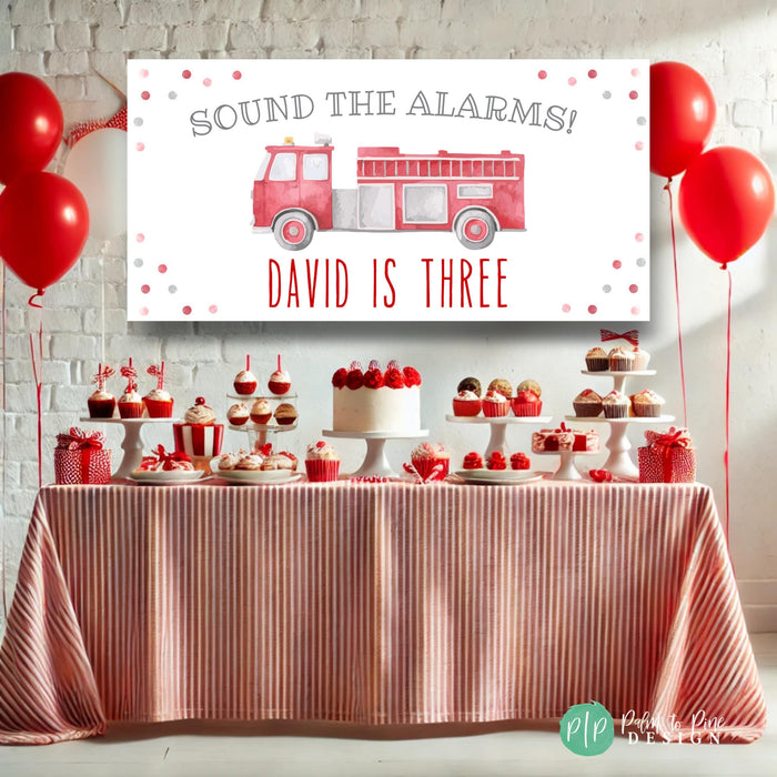 Modern watercolor firetruck birthday banner with “Sound the Alarms” text and confetti dots, personalized for a boy’s birthday with name and age included.