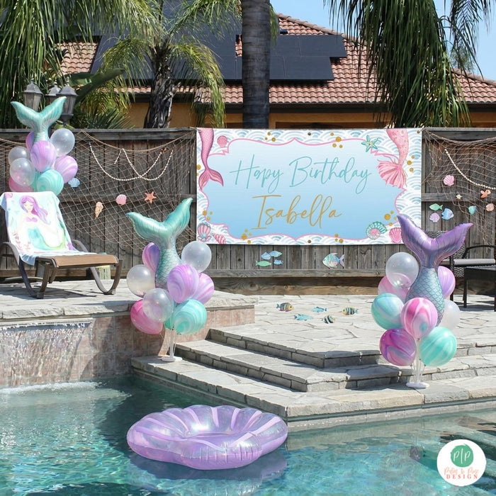 Mermaid pool party birthday with personalized banner, and mermaid tail balloon bundles