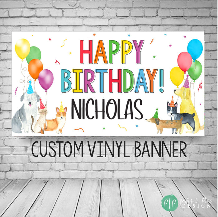 dog birthday party banner with colorful balloons and dogs in party hats