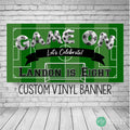 soccer birthday banner with soccer ball lettering on soccer field background