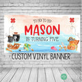 pirate birthday banner with watercolor beach background, pirate ship, jolly roger flag, pirate gold and a treasure map. Font reads Yo Ho Yo Ho, let's celebrate and is personalized with the birthday boys name
