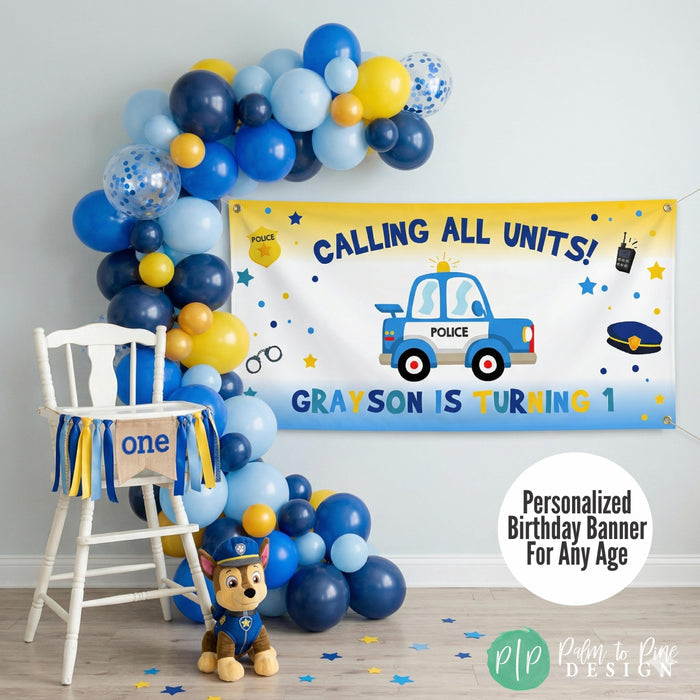 police birthday banner styled for first birthday high chair photo shoot. Includes personalized 1st birthday banner in cop car theme, with balloon garland and high chair.