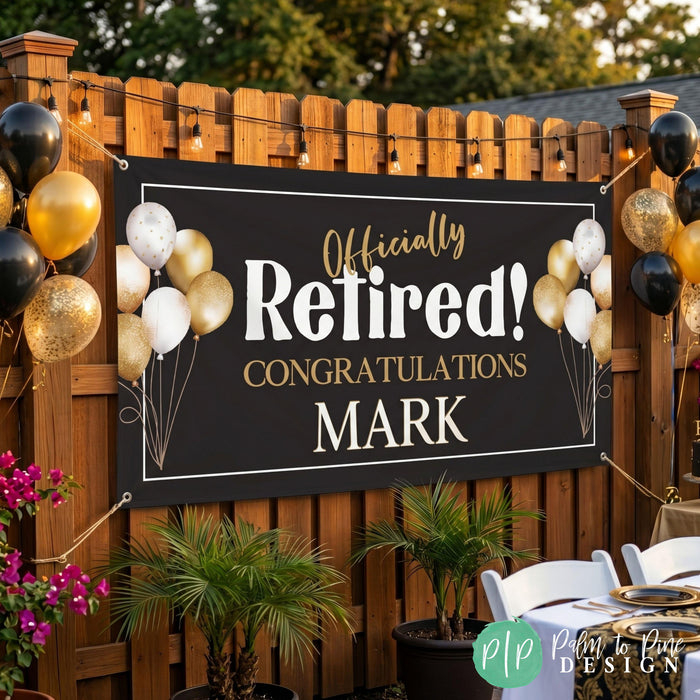 Officially Retired Vinyl Banner in black and gold color scheme hung outdoors from a fence for an elegant retirement party