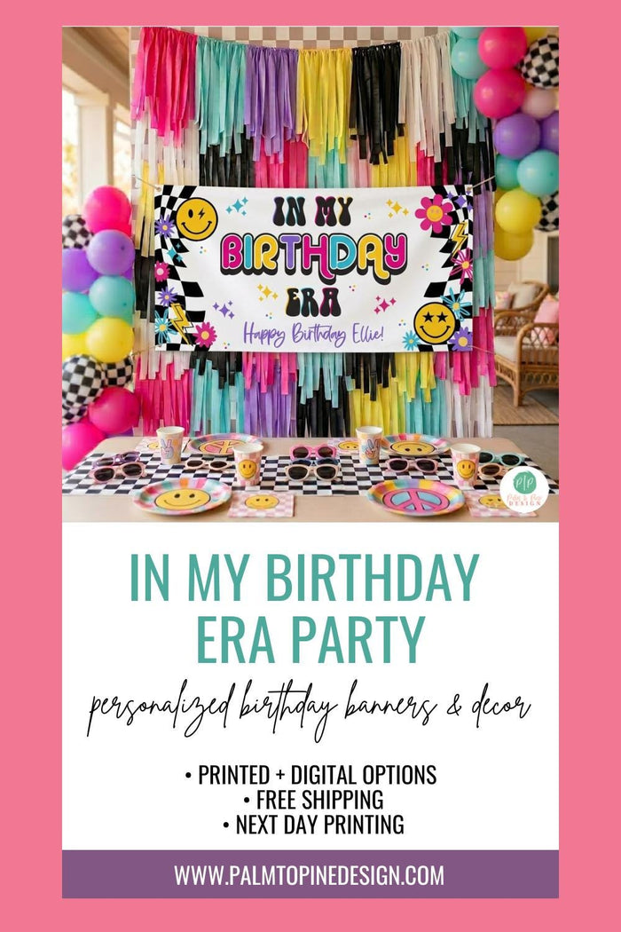 Personalized vinyl banner for an "In My Birthday Era" party. Reads "Happy Birthday Ellie!" with retro smiley faces, checkerboard accents, and stars, hung with silver grommets on a colorful fringe backdrop over a styled kids party table.