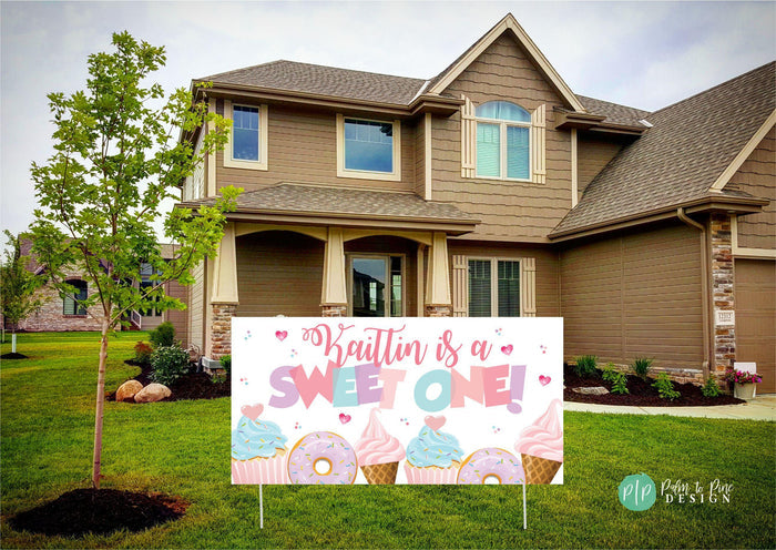 Pastel "Two Sweet" birthday backdrop with cute donuts, cupcakes, and ice cream displayed as welcome sign in front yard
