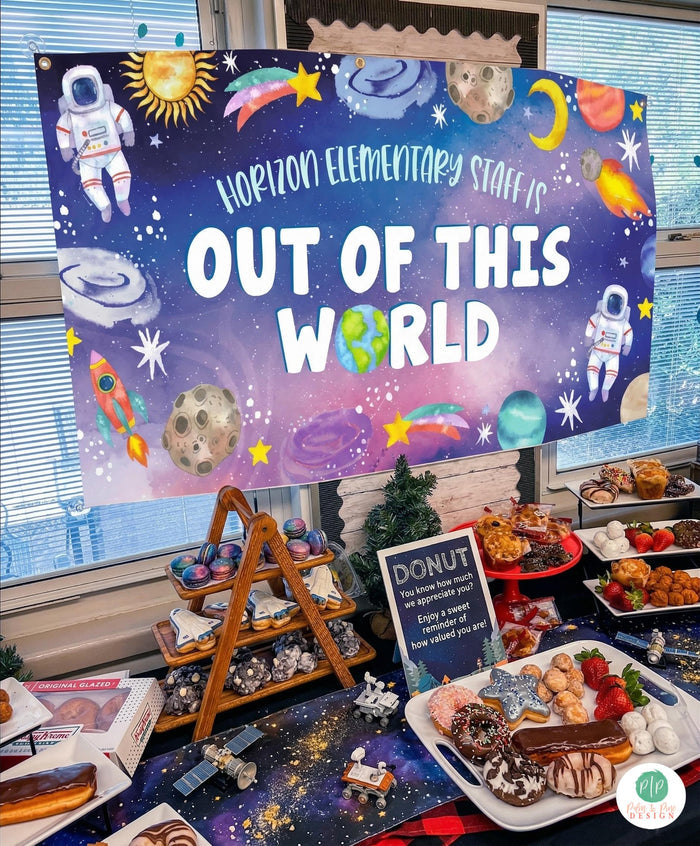 teacher appreciation week set up in space theme with personalized "out of this world" galaxy banner and outer space donut display