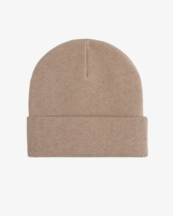 A front view of The Beanie in beige, laid flat on a white background. The image highlights the fine knit material and the classic fold-over cuff.