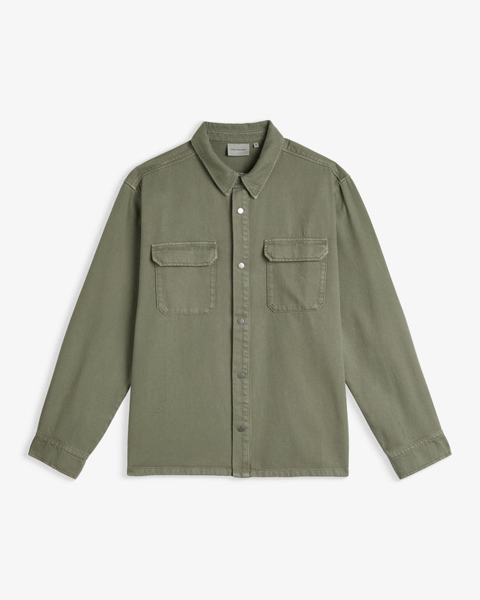 The Bilbao Overshirt in olive — front view showing chest pockets and button closure