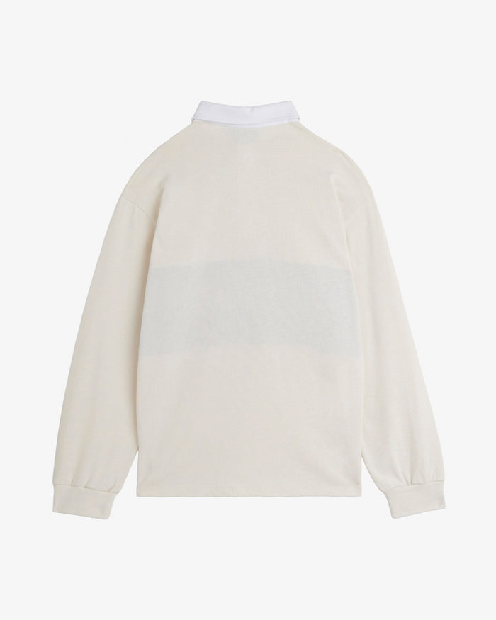 A back view of The c'est pari Rugby Shirt in cream, laid flat on a white background. The image highlights the contrasting white collar and long sleeves.