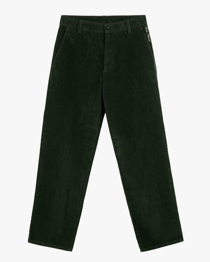 A front view of The CÔTELÉ Corduroy Straight Pants in forest green, laid flat on a white background. The image highlights the flat front design, straight leg, belt loops, and the contrast c'est normal logo stitching at the left hip.