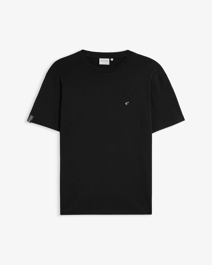 The Forever T-shirt in black — front view with a small white logo on the chest