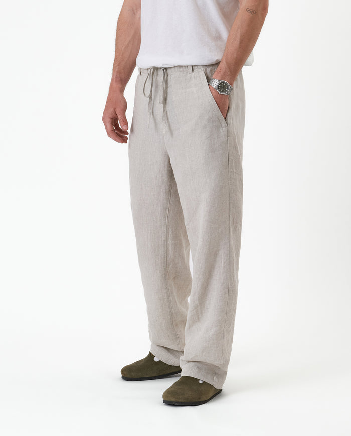 The Holiday Linen Trouser in natural — side angle view against a white background