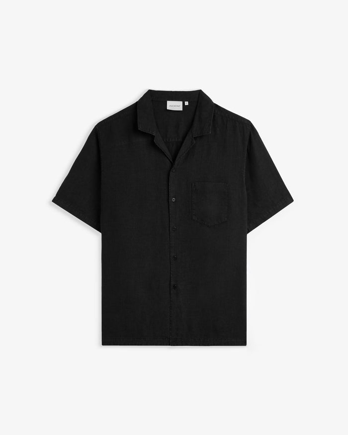The Holiday Linen Resort Shirt in black — front view with a camp collar and chest pocket