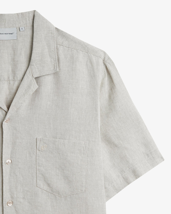 The Holiday Linen SS Shirt in natural — close-up of the chest pocket and linen texture