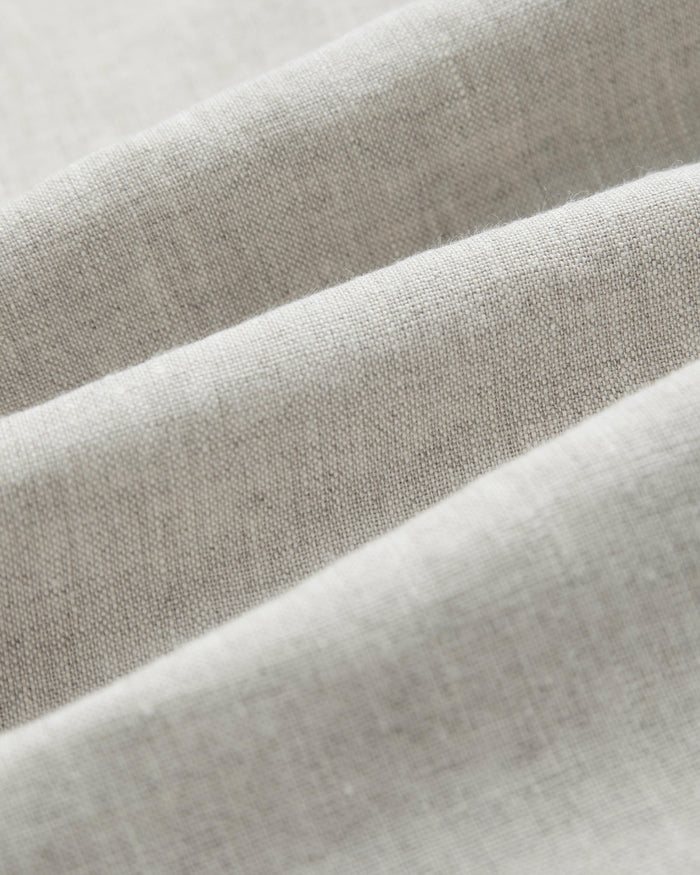 The Holiday Linen SS Shirt in Natural — close-up of the textured fabric weave