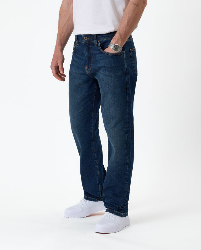 The Jeans Classic Straight Fit in mid wash blue — front view showing the straight leg silhouette