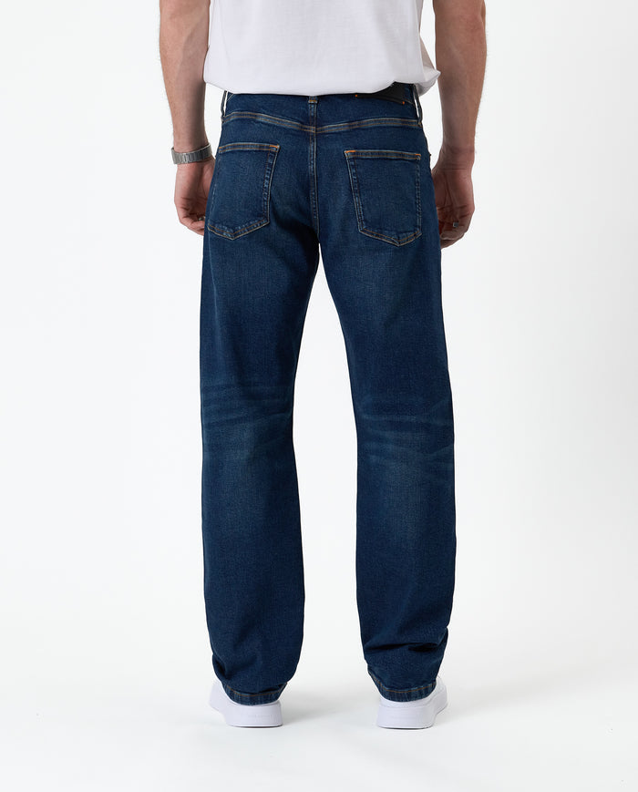 The Jeans Classic Straight Fit in Mid Wash Blue — back view showing the straight leg silhouette