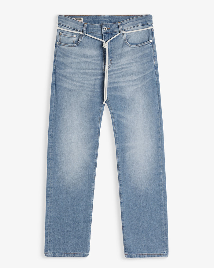 The Jeans Classic Straight Fit in light mid blue — front view with a white drawstring belt