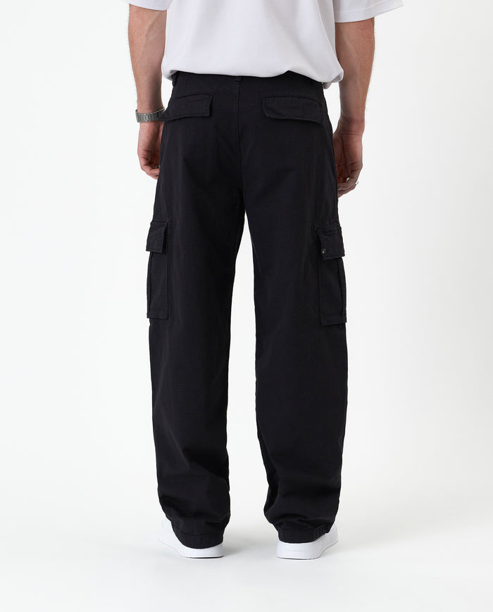 The Monterey Cargo Pant in black — back view showing the cargo pockets and relaxed fit