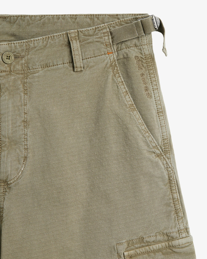 The Monterrey Cargo Pant in Light Khaki — close-up of the adjustable waist and pocket
