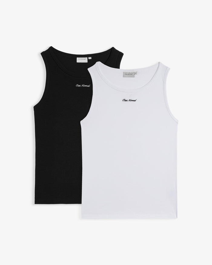 The Ribbed Tank Top 2-Pack in black and white — featuring C'est normal logo and ribbed texture